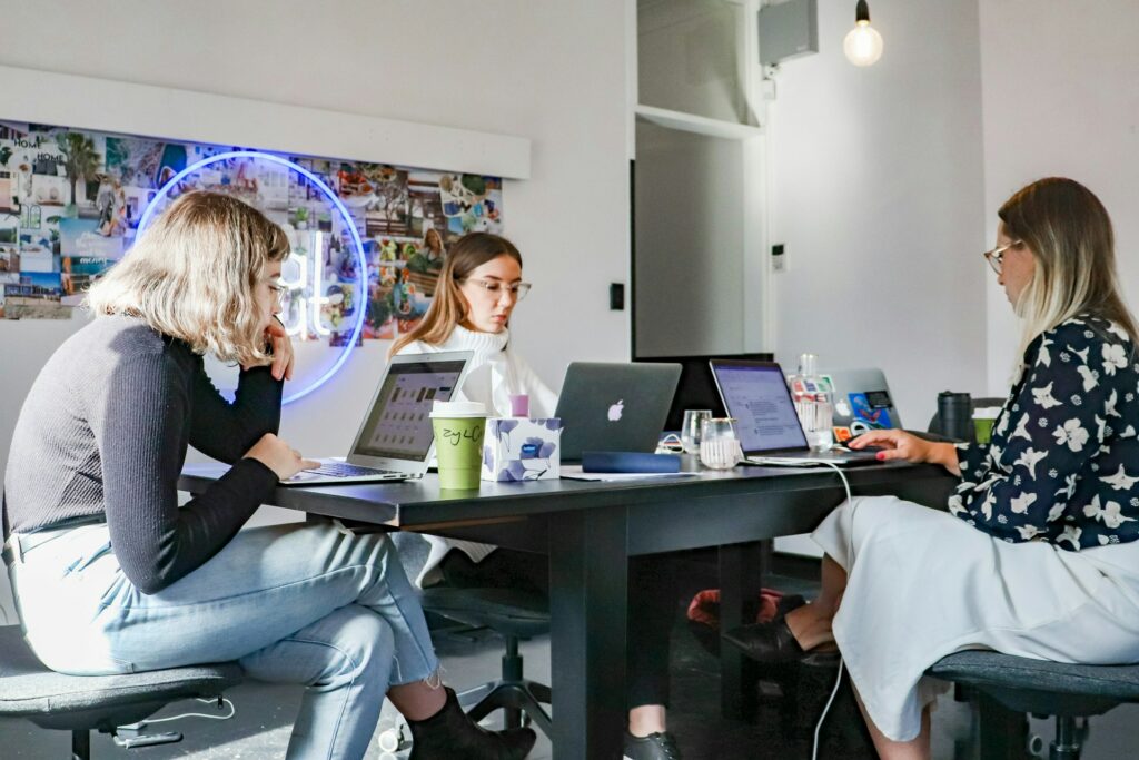 A group of professionals working around a desk